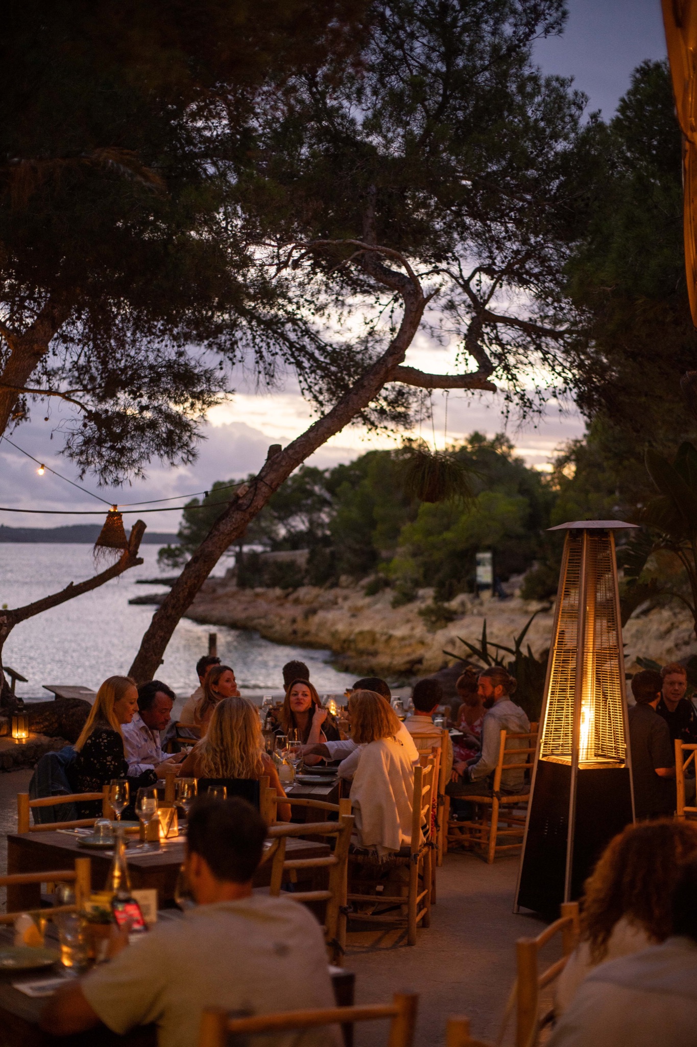 Guests dining outdoors at Beat Hotel in Ibiza