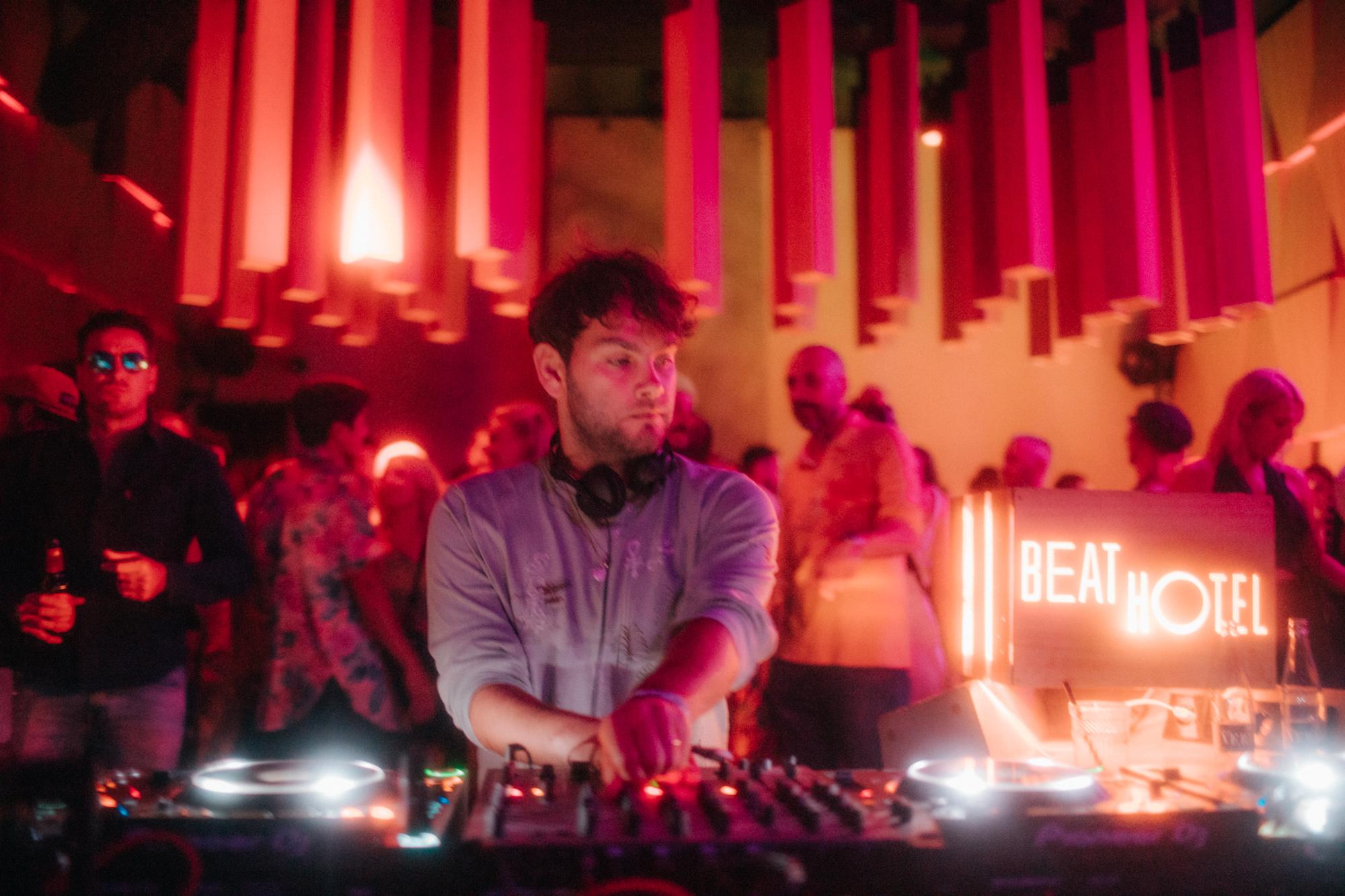 DJ performing at a Beat Hotel night event